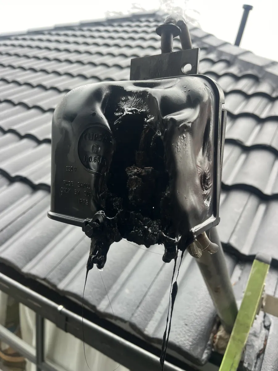 Burnt out service fuse removed from a Melbourne home during emergency electrical work
